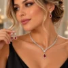 Σετ ασημί κολιέ και σκουλαρίκια με κόκκινες πέτρες σε σχήμα σταγόνας